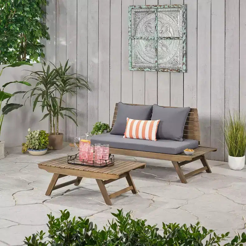 Ensemble causeuse et table basse d'extérieur en bois d'acacia avec coussin