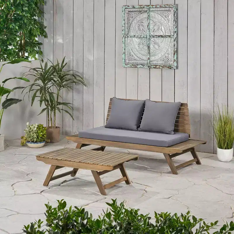 Ensemble causeuse et table basse d'extérieur en bois d'acacia avec coussin